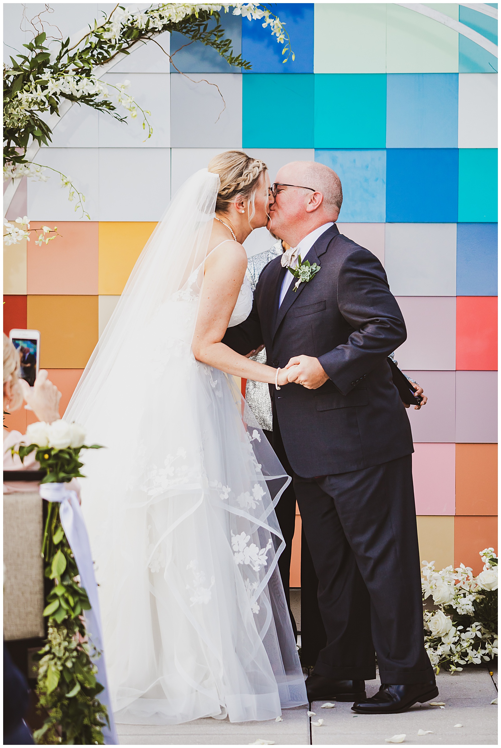 first kiss during a modern wedding