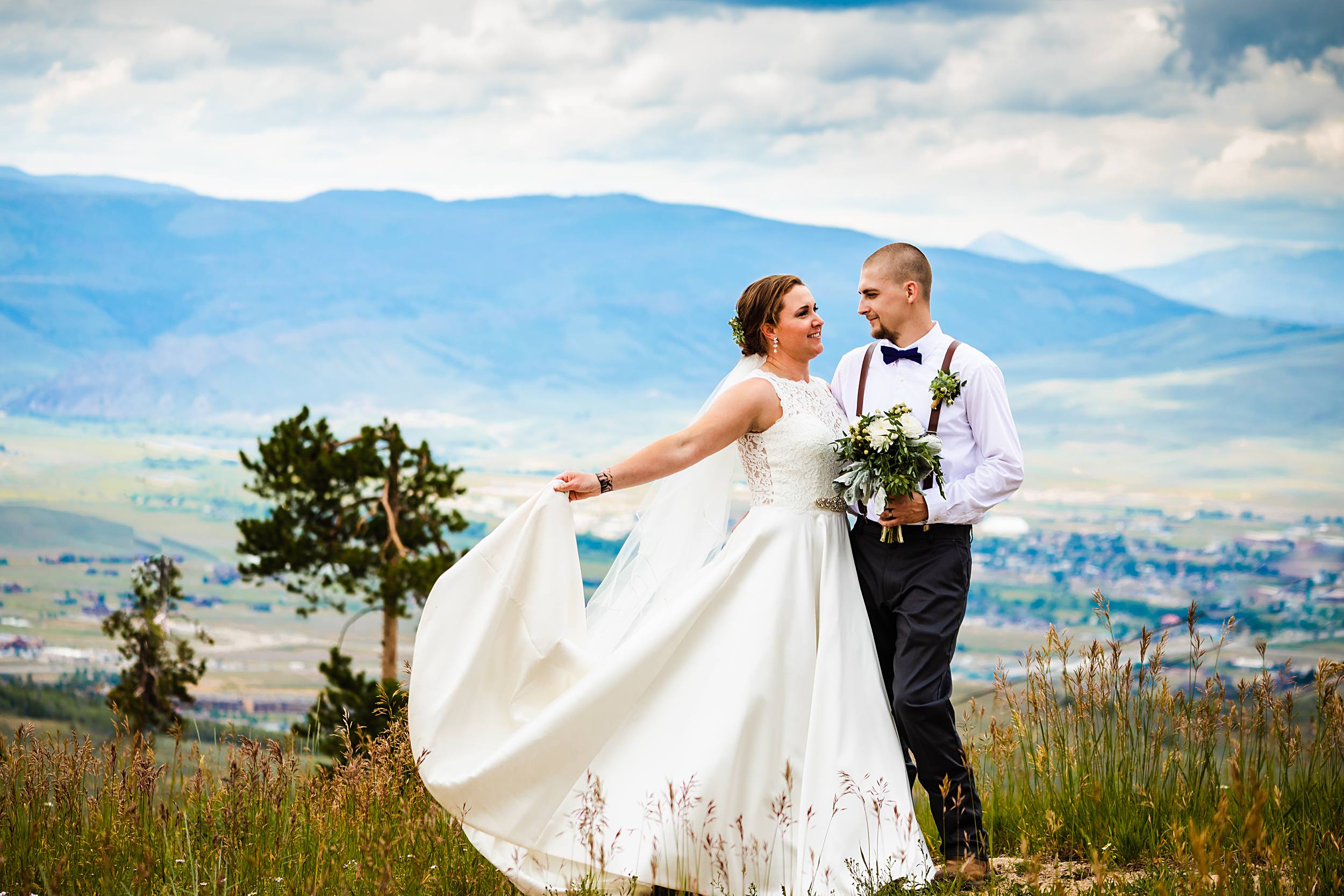 Couple photos overlooking valley at Granby Ranch